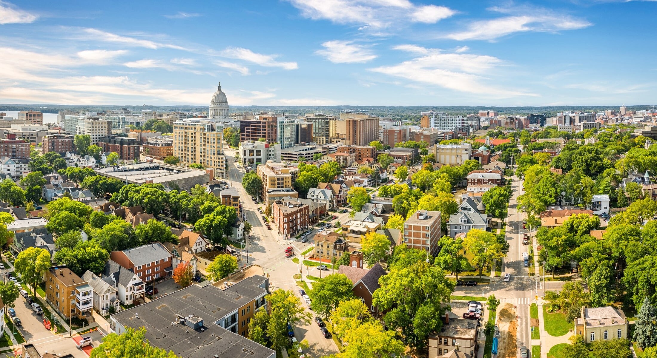 Aerial view of urban landscape and greenery.
